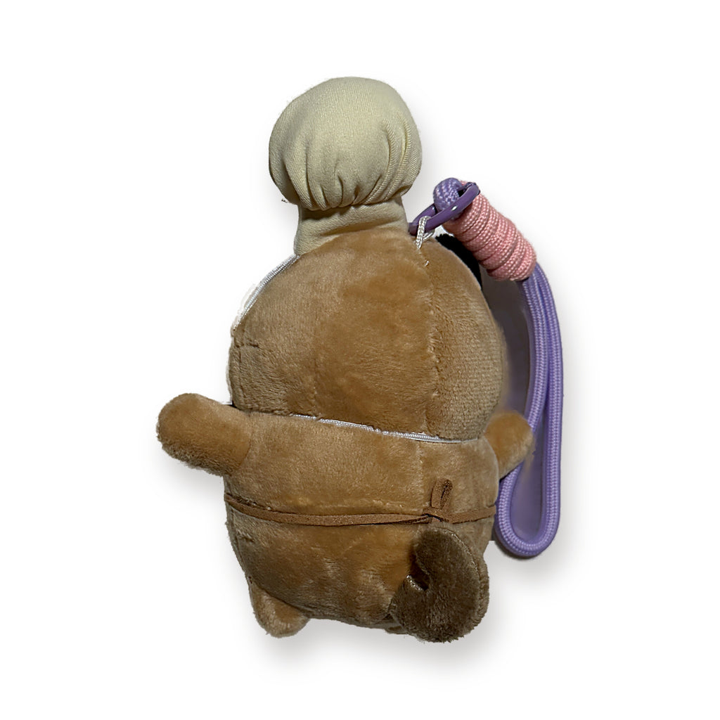 PUUG pug plush bag charm in a cream chef hat, back view with paracord strap