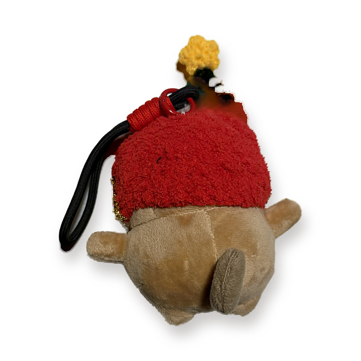 PUUG pug plush bag charm in a red crochet santa hat, back view with strap