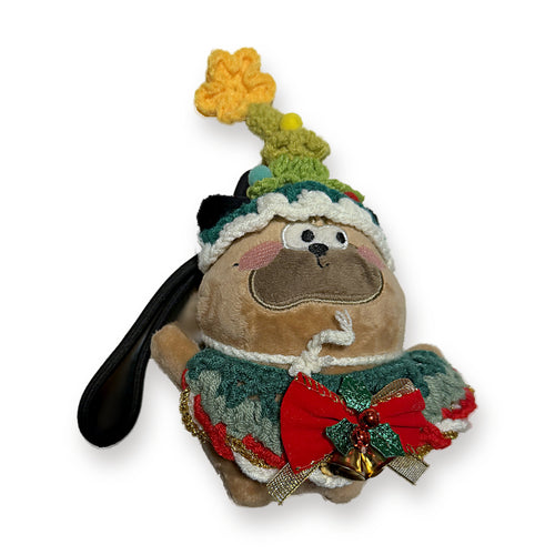 PUUG pug plush bag charm in a green crochet christmas tree hat with red bow, front view